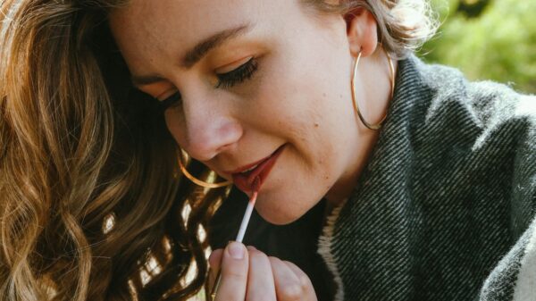 a woman with a cigarette in her mouth