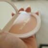 A person holding a compact compact compact compact compact compact compact compact compact compact compact compact