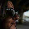 woman wearing black framed sunglasses