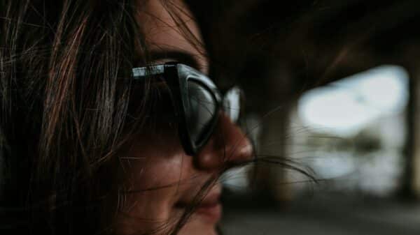 woman wearing black framed sunglasses