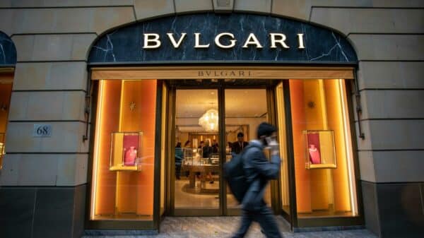 a man walking past a bulguri store