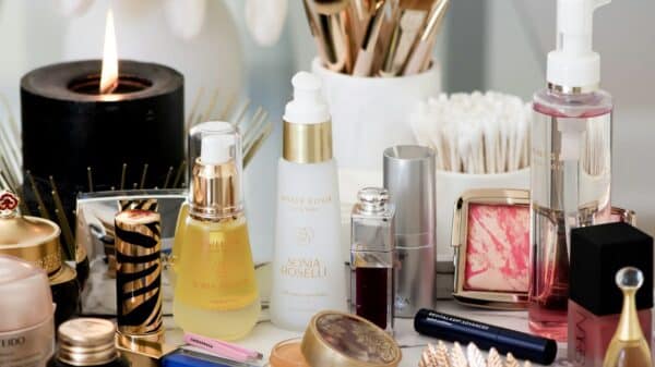 white and gold perfume bottle