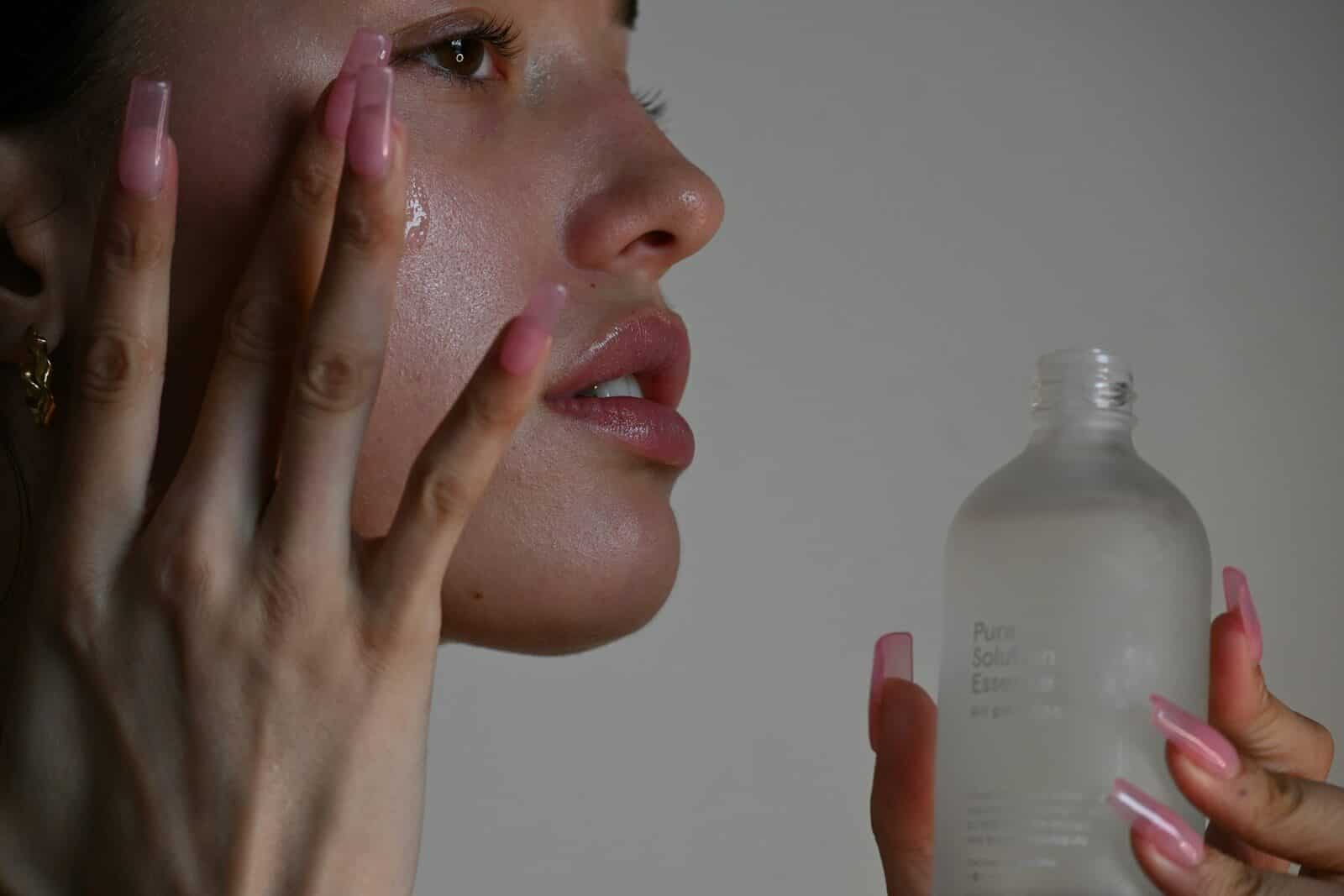 a person holding a bottle