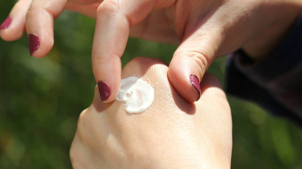 person with white nail polish